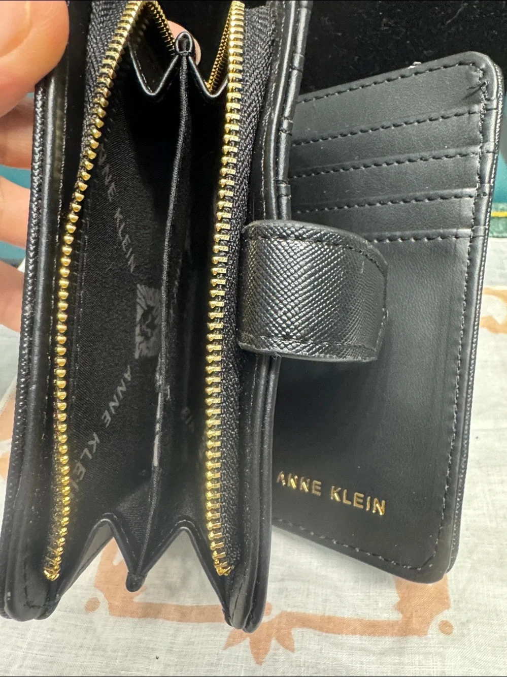 Anne Klein Black Saffiano Zip Wallet with Gold Horsebit Accent